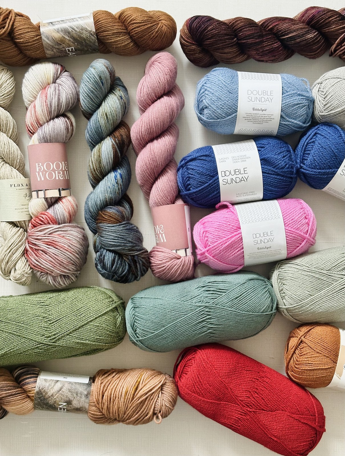 A flat lay of skeins in many colors